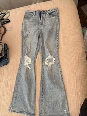 Distressed Light Blue Flare Jeans